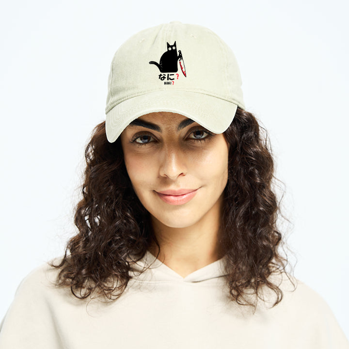 A Puzzled Cat Holding A Knife Washed Cap